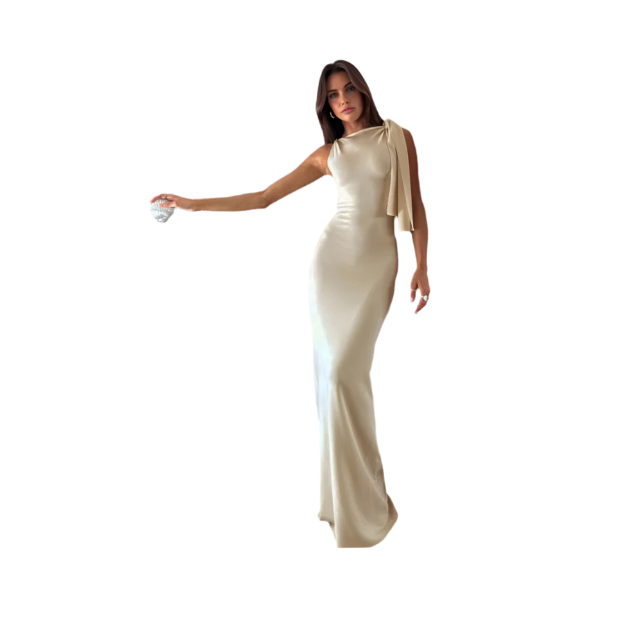 Woman wearing a beige evening gown on a white background