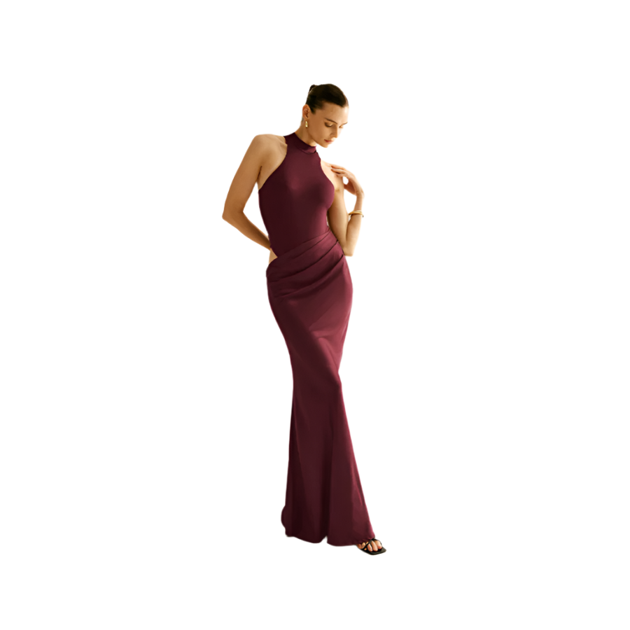 Woman wearing a burgundy evening gown on a white background