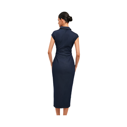 Woman wearing a navy blue dress on a white background