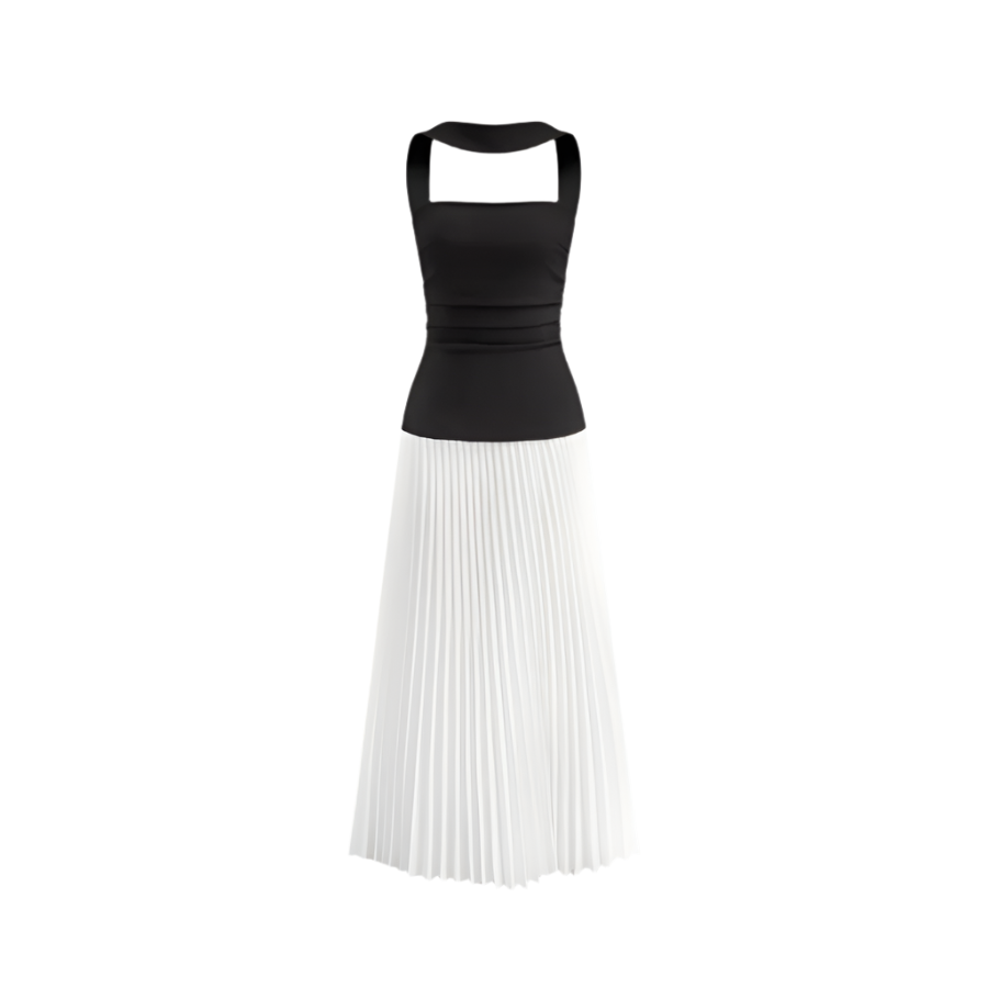 Black top and white pleated skirt set on a white background